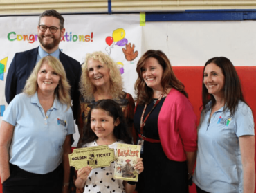 The Book Fairies Distribute Their 4 Millionth Book at an Elementary School in Glen Cove
